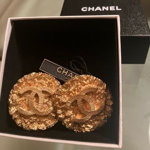 Circa 1993 Authentic Chanel Earrings.Gold Nugget motif texture. Large CC logo